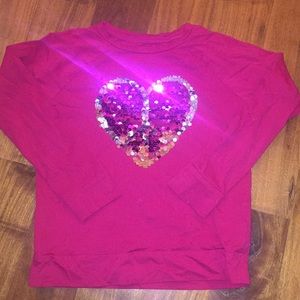 Top with flip sequin heart